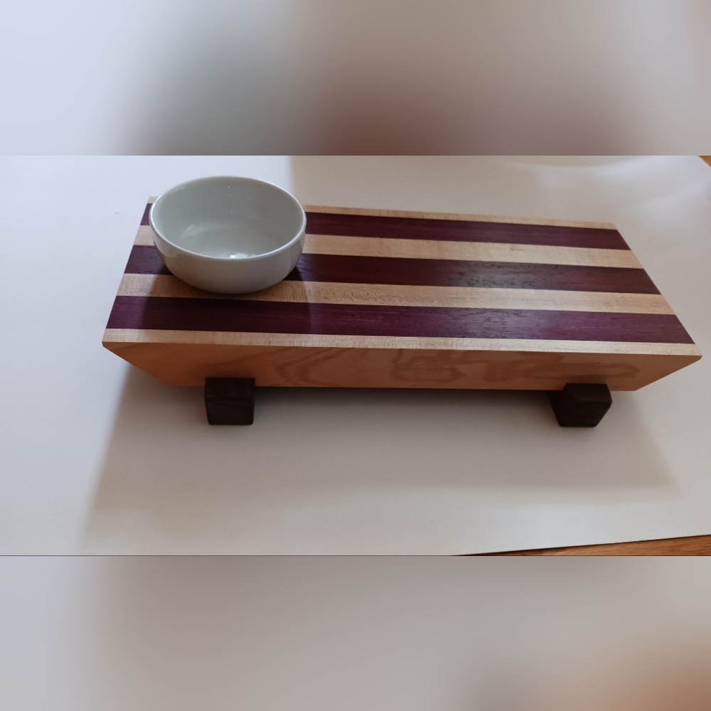 Sushi board with dipping bowl